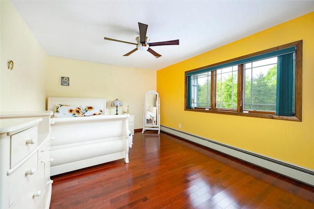 129 Clinton Corners Rd, Salt Point, NY 12578 - bedroom with a baseboard heating unit, wood finished floors, and ceiling fan
