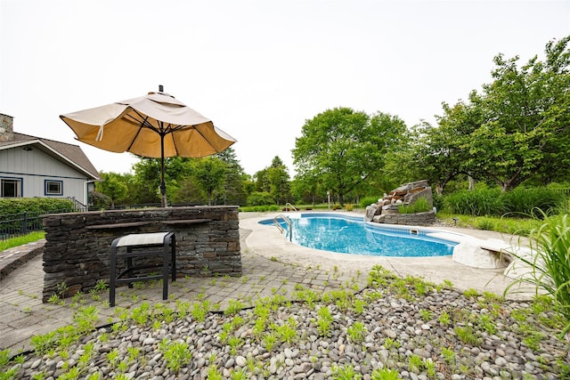 129 Clinton Corners Rd, Salt Point, NY 12578 - swimming pool featuring a patio area and view of wooded area