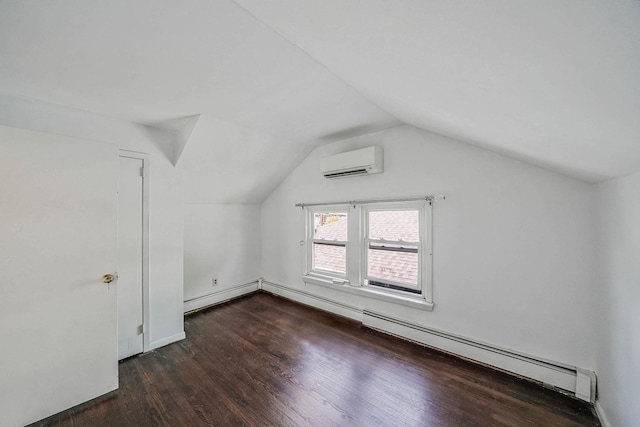 10 June Ave, Bayville, NY 11709 - bonus room with a wall mounted air conditioner, wood finished floors, vaulted ceiling, baseboards, and baseboard heating