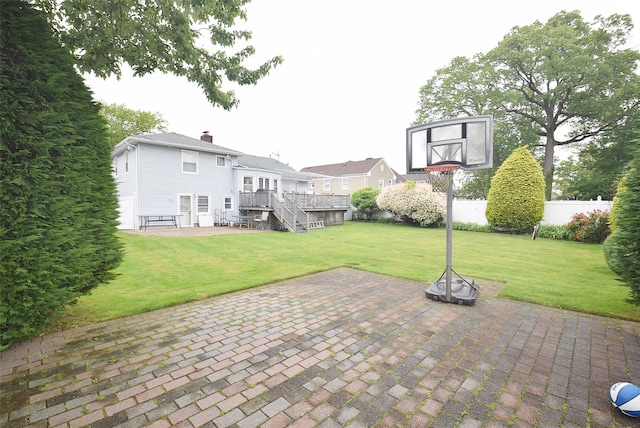 67 Hungry Harbor Rd, Valley Stream, NY 11581 - back of house with a patio area, a wooden deck, a chimney, and stairway