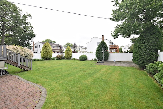 67 Hungry Harbor Rd, Valley Stream, NY 11581 - view of yard with a residential view and a patio