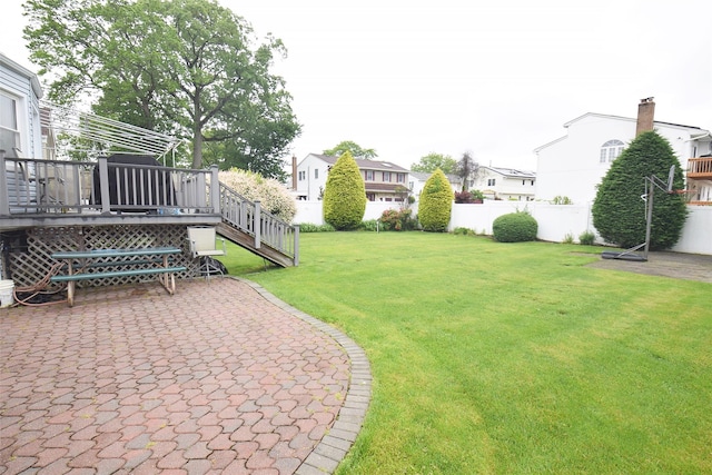 67 Hungry Harbor Rd, Valley Stream, NY 11581 - view of yard featuring a patio area, a wooden deck, stairs, and a residential view