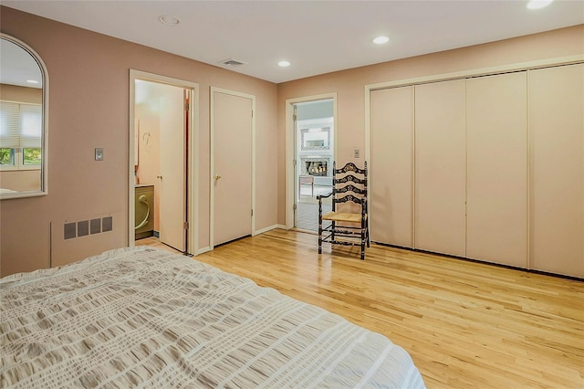 6 Laurel Way, Sea Cliff, NY 11579 - bedroom featuring radiator, light wood finished floors, recessed lighting, and a closet