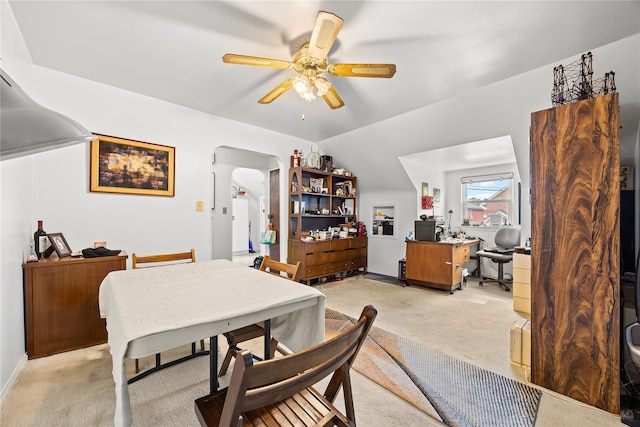 150-44 23rd Ave, Whitestone, NY 11357 - dining space with a ceiling fan, arched walkways, light carpet, and vaulted ceiling