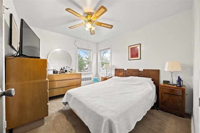 150-44 23rd Ave, Whitestone, NY 11357 - bedroom featuring radiator heating unit, light carpet, and ceiling fan