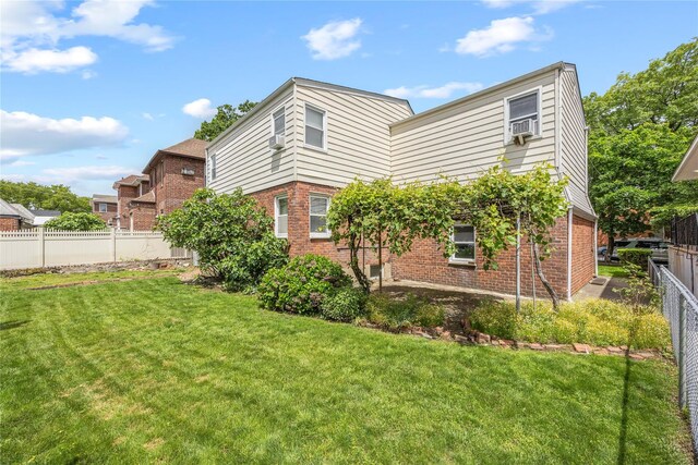 150-44 23rd Ave, Whitestone, NY 11357 - back of house featuring brick siding and cooling unit