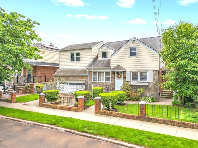 150-44 23rd Ave, Whitestone, NY 11357 - view of front facade with an attached garage and stone siding