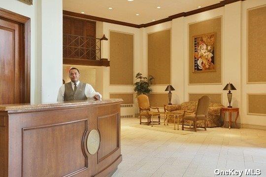 ONE Bay Club Dr Unit 18S, Bayside, NY 11360 - reception with ornamental molding