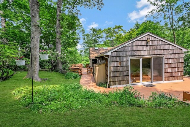 10 Maple Ave, Setauket, NY 11733 - back of house with a wooden deck and a yard