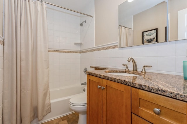 12 5th Pl, Garden City, NY 11530 - full bath featuring vanity, shower / bathtub combination with curtain, toilet, and tile walls