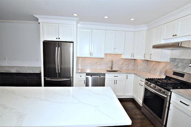 206-07 Lori Dr Unit 60M, Bayside, NY 11360 - kitchen with appliances with stainless steel finishes, a sink, white cabinetry, light stone countertops, and ornamental molding