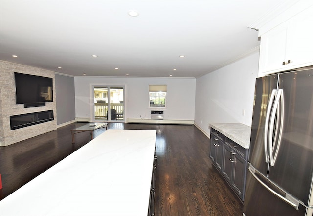 206-07 Lori Dr Unit 60M, Bayside, NY 11360 - kitchen with freestanding refrigerator, open floor plan, dark wood-type flooring, crown molding, and white cabinetry