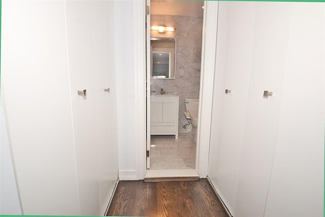 206-07 Lori Dr Unit 60M, Bayside, NY 11360 - hall featuring dark wood-style flooring and tile walls
