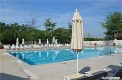 206-07 Lori Dr Unit 60M, Bayside, NY 11360 - community pool with a patio