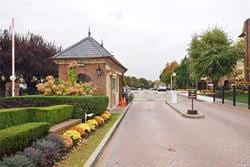 206-07 Lori Dr Unit 60M, Bayside, NY 11360 - view of road with street lights and curbs