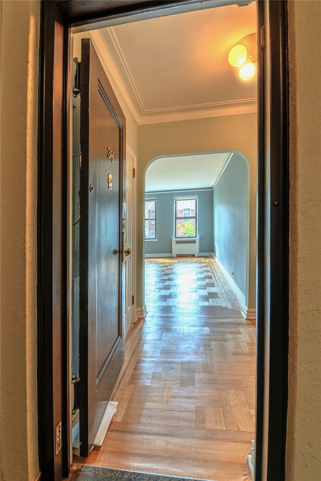 190 E Mosholu Pkwy S Unit 3H, Bronx, NY 10458 - hall with crown molding, arched walkways, and baseboards