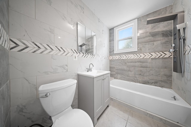 114-23 Sutter Ave, South Ozone Park, NY 11420 - full bathroom with tile walls, vanity, toilet,  shower combination, and tile patterned floors