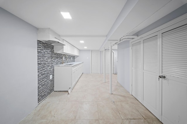 114-23 Sutter Ave, South Ozone Park, NY 11420 - laundry room featuring a sink