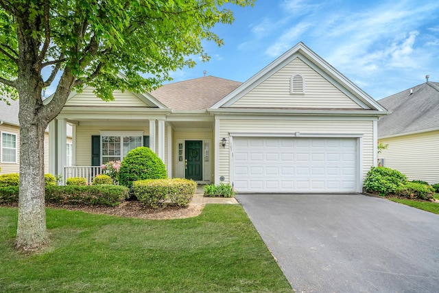 105 Louden Loop, Mount Sinai, NY 11766 - view of front of home featuring driveway, an attached garage, a front yard, and a porch