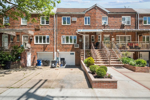 1549 E 57th St, Brooklyn, NY 11234 - multi unit property with driveway, a garage, and brick siding