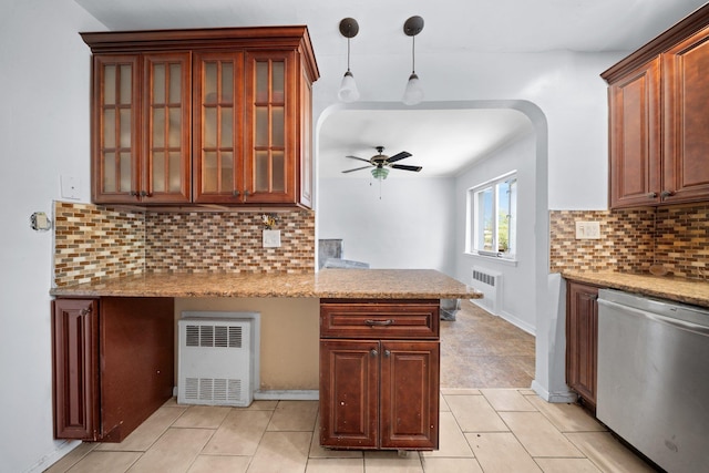1549 E 57th St, Brooklyn, NY 11234 - kitchen with stainless steel dishwasher, a ceiling fan, pendant lighting, a peninsula, and light tile patterned flooring