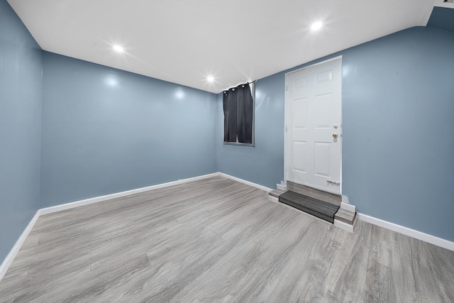 1549 E 57th St, Brooklyn, NY 11234 - spare room with wood finished floors, baseboards, and recessed lighting