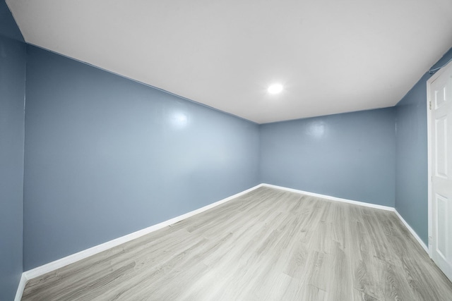 1549 E 57th St, Brooklyn, NY 11234 - unfurnished room with light wood-style flooring, baseboards, and recessed lighting