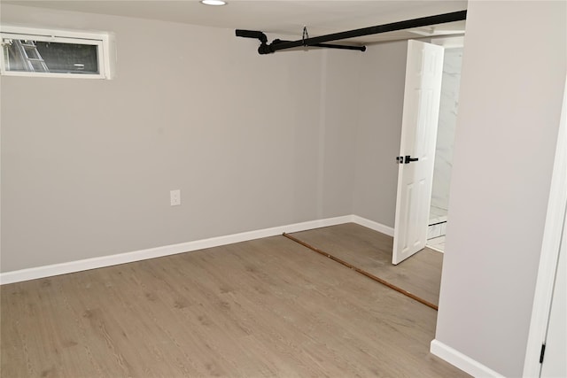 200-13 116th Ave, Saint Albans, NY 11412 - unfurnished room with wood finished floors, baseboards, and recessed lighting