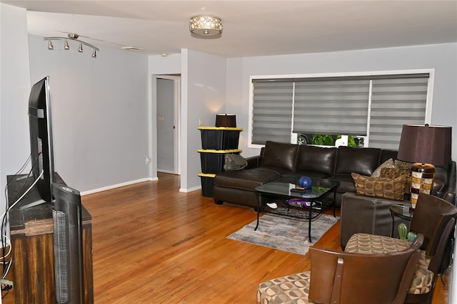 1510 Rica Pl, Valley Stream, NY 11580 - living area featuring wood finished floors and baseboards