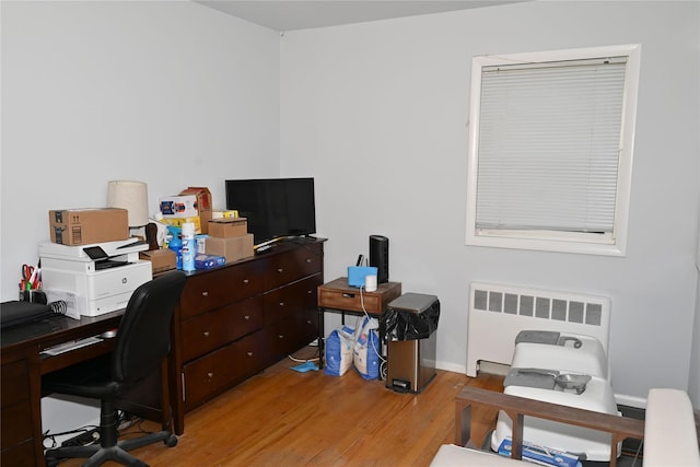 1510 Rica Pl, Valley Stream, NY 11580 - home office featuring radiator, light wood finished floors, and baseboards