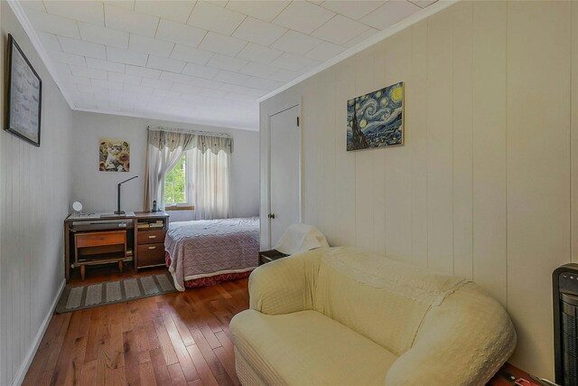 20 Baylis Pl, Syosset, NY 11791 - bedroom featuring hardwood / wood-style flooring and crown molding