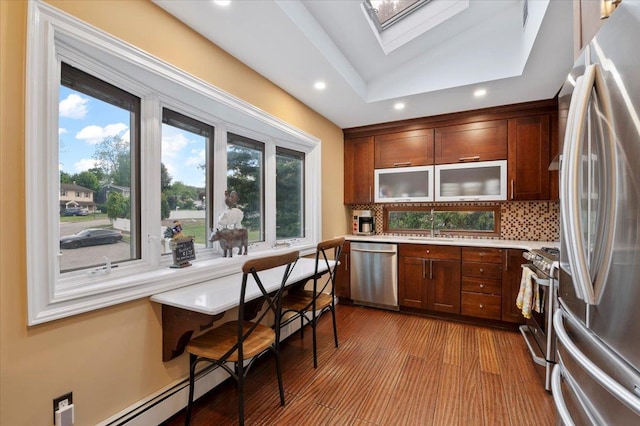 3 Knight Ln, Kings Park, NY 11754 - kitchen with appliances with stainless steel finishes, a sink, light countertops, recessed lighting, and backsplash