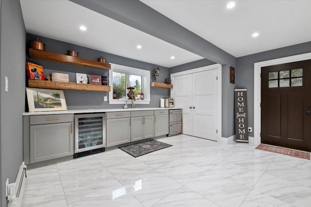 3 Knight Ln, Kings Park, NY 11754 - indoor dry bar featuring wine cooler, light marble finish flooring, recessed lighting, baseboards, and baseboard heating