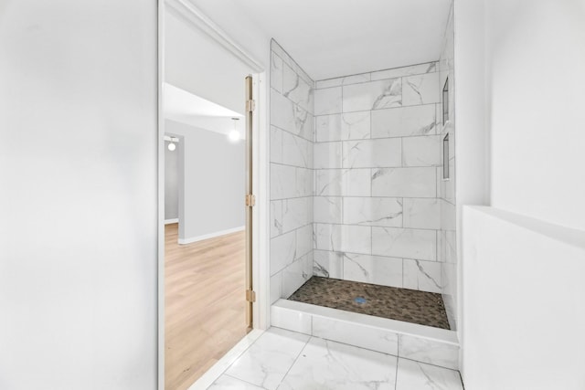 83 Scott Dr, Wappingers Falls, NY 12590 - bathroom with a marble finish shower and marble look tile flooring