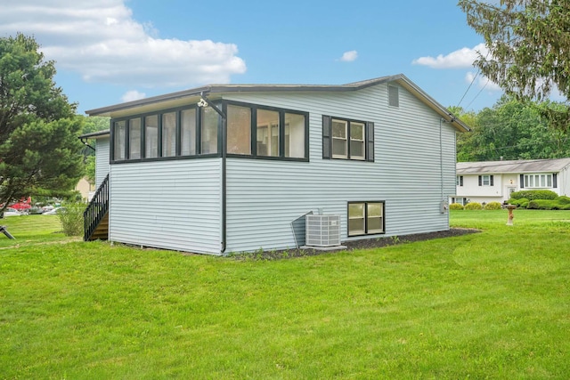 83 Scott Dr, Wappingers Falls, NY 12590 - view of home's exterior featuring a lawn