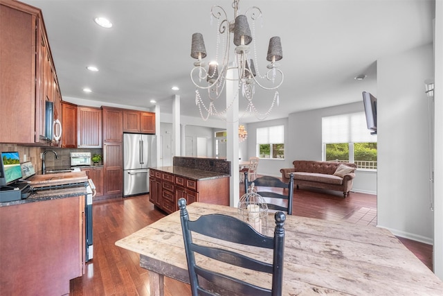 1 Country Club Dr, Middletown, NY 10940 - kitchen featuring stainless steel appliances, a chandelier, recessed lighting, dark countertops, and dark wood-style flooring
