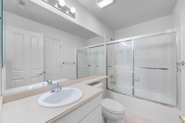 1 Country Club Dr, Middletown, NY 10940 - bathroom featuring toilet, vanity, shower / bath combination with glass door, and tile patterned floors