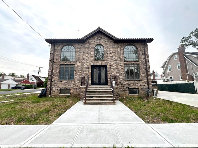36-46 205th St, Bayside, NY 11361 - view of front of home with french doors and brick siding