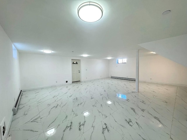 36-46 205th St, Bayside, NY 11361 - basement featuring a baseboard radiator and baseboards