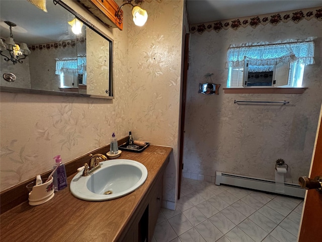4 Susan Ct, Deer Park, NY 11729 - bathroom featuring a baseboard radiator and vanity