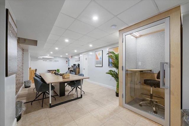 210 Pelham Rd Unit 6F, New Rochelle, NY 10805 - tiled dining space with recessed lighting, a drop ceiling, and baseboards