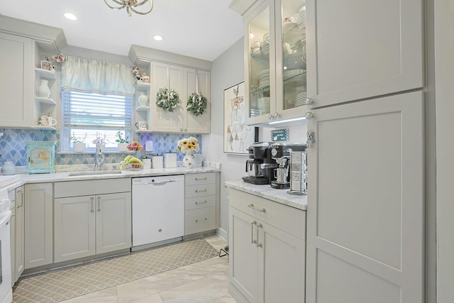 135-5 S Highland Ave Unit D4, Ossining, NY 10562 - kitchen featuring dishwasher, open shelves, backsplash, light marble finish floors, and recessed lighting