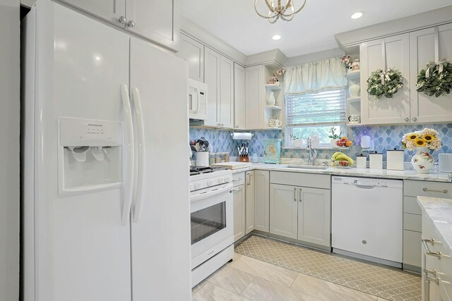 135-5 S Highland Ave Unit D4, Ossining, NY 10562 - kitchen featuring white appliances, a sink, open shelves, tasteful backsplash, and recessed lighting