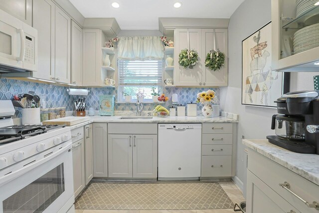 135-5 S Highland Ave Unit D4, Ossining, NY 10562 - kitchen with white appliances, open shelves, a sink, decorative backsplash, and recessed lighting