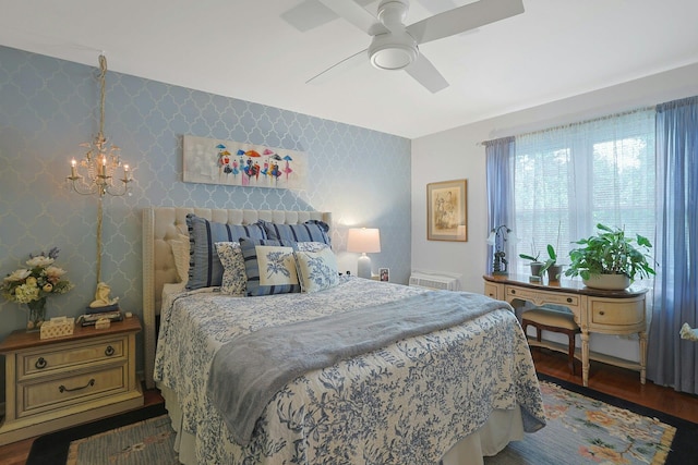 135-5 S Highland Ave Unit D4, Ossining, NY 10562 - bedroom with a chandelier, wood finished floors, and a ceiling fan