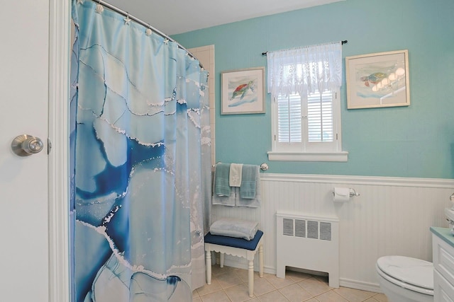 135-5 S Highland Ave Unit D4, Ossining, NY 10562 - full bathroom featuring radiator heating unit, toilet, a wainscoted wall, tile patterned flooring, and vanity