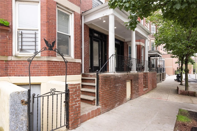 3496 Fort Independence St, Bronx, NY 10463 - entrance to property with brick siding and a gate