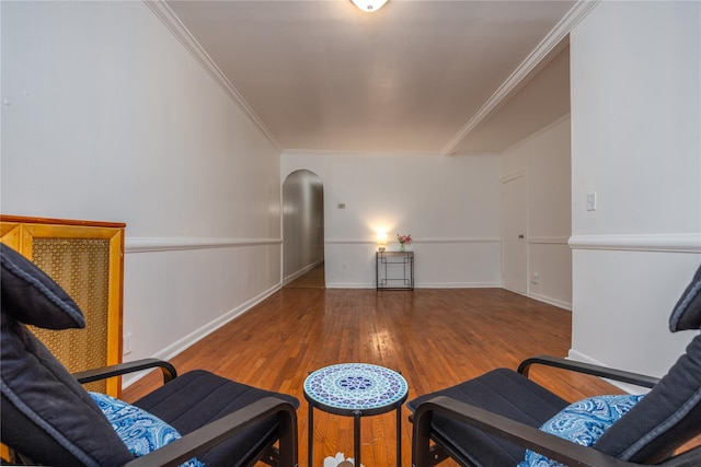 3496 Fort Independence St, Bronx, NY 10463 - sitting room featuring arched walkways, wood finished floors, ornamental molding, and baseboards