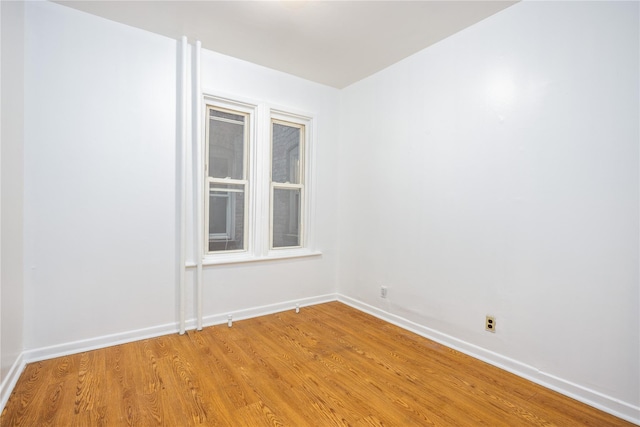 3496 Fort Independence St, Bronx, NY 10463 - empty room with light wood finished floors and baseboards