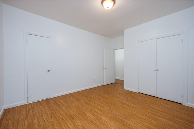 3496 Fort Independence St, Bronx, NY 10463 - unfurnished bedroom with light wood-type flooring, baseboards, and a closet